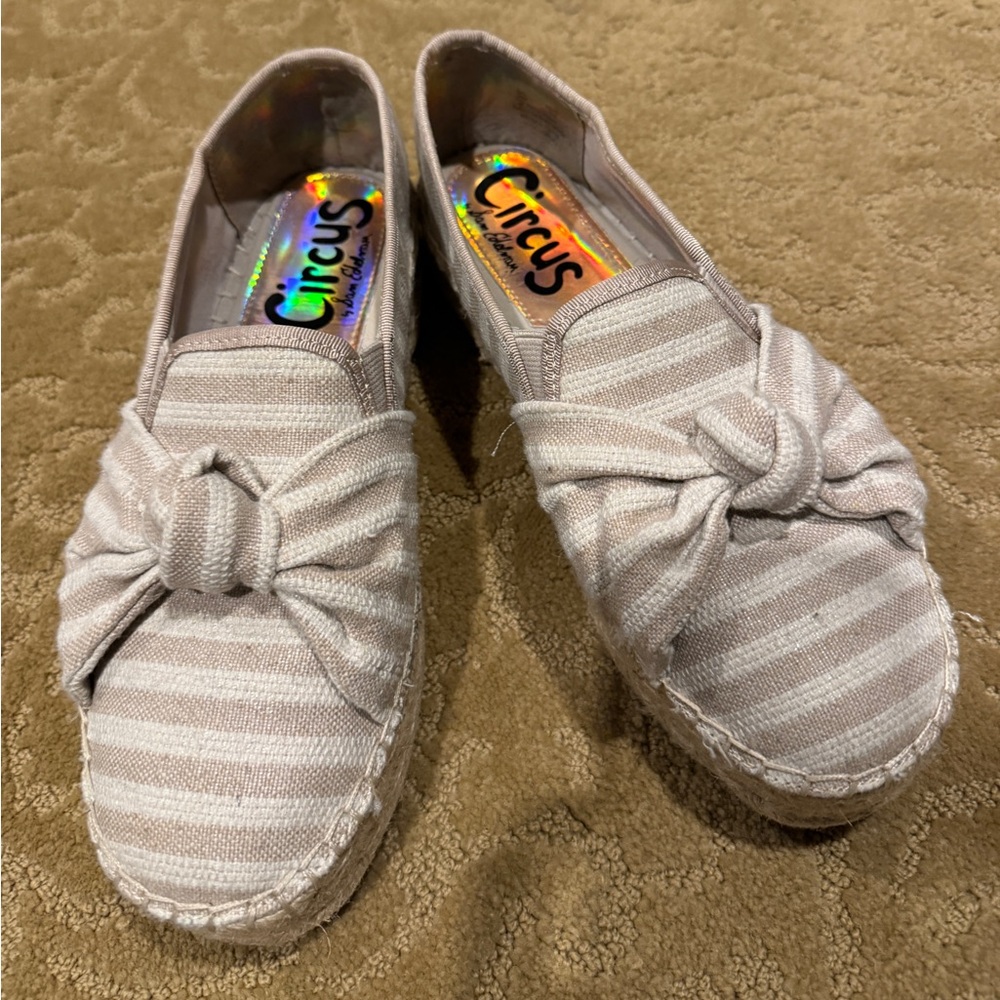 Adorable canvas tan and white espadrille.
